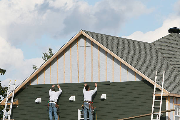 Professional Siding technician working in Morrisville, NC